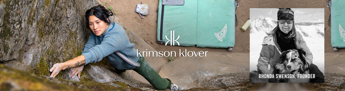 A promotional banner for Krimson Klover featuring a woman in outdoor gear climbing a rocky cliff, a black-and-white inset photo of Rhonda Swenson with a dog, and teal branded storage containers in the background.