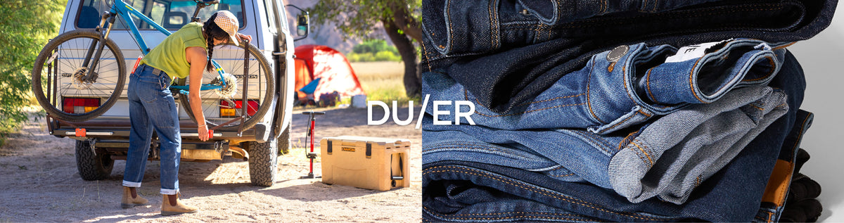 A split promotional image showing a person loading a bicycle and packing gear into the back of a white van outdoors on the left, and a close-up stack of folded blue denim jeans on the right. Large white text across the center reads 'DU/ER'.