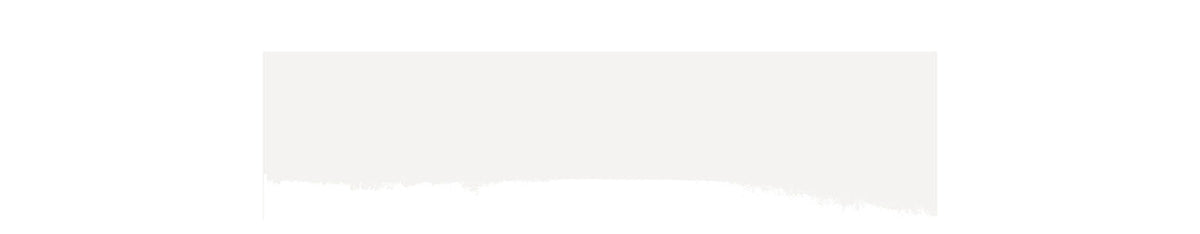 A wide, thin rectangular strip of off-white material with a rough, torn edge, shown against a solid black background.