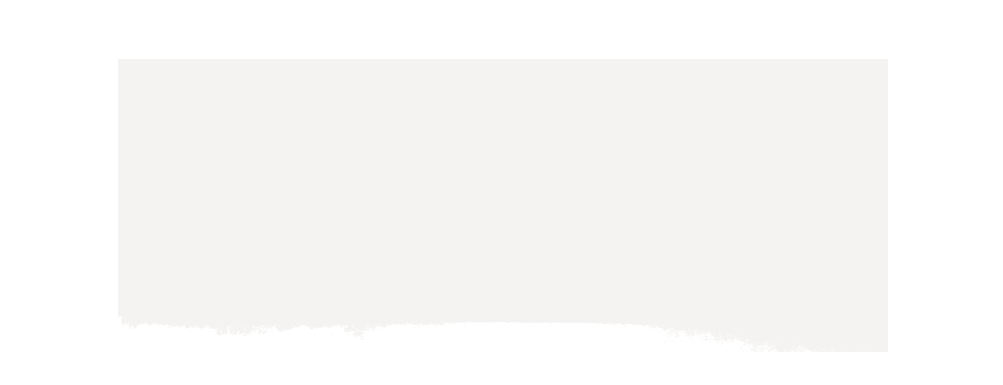 A wide, solid off-white rectangular block centered on a black background.