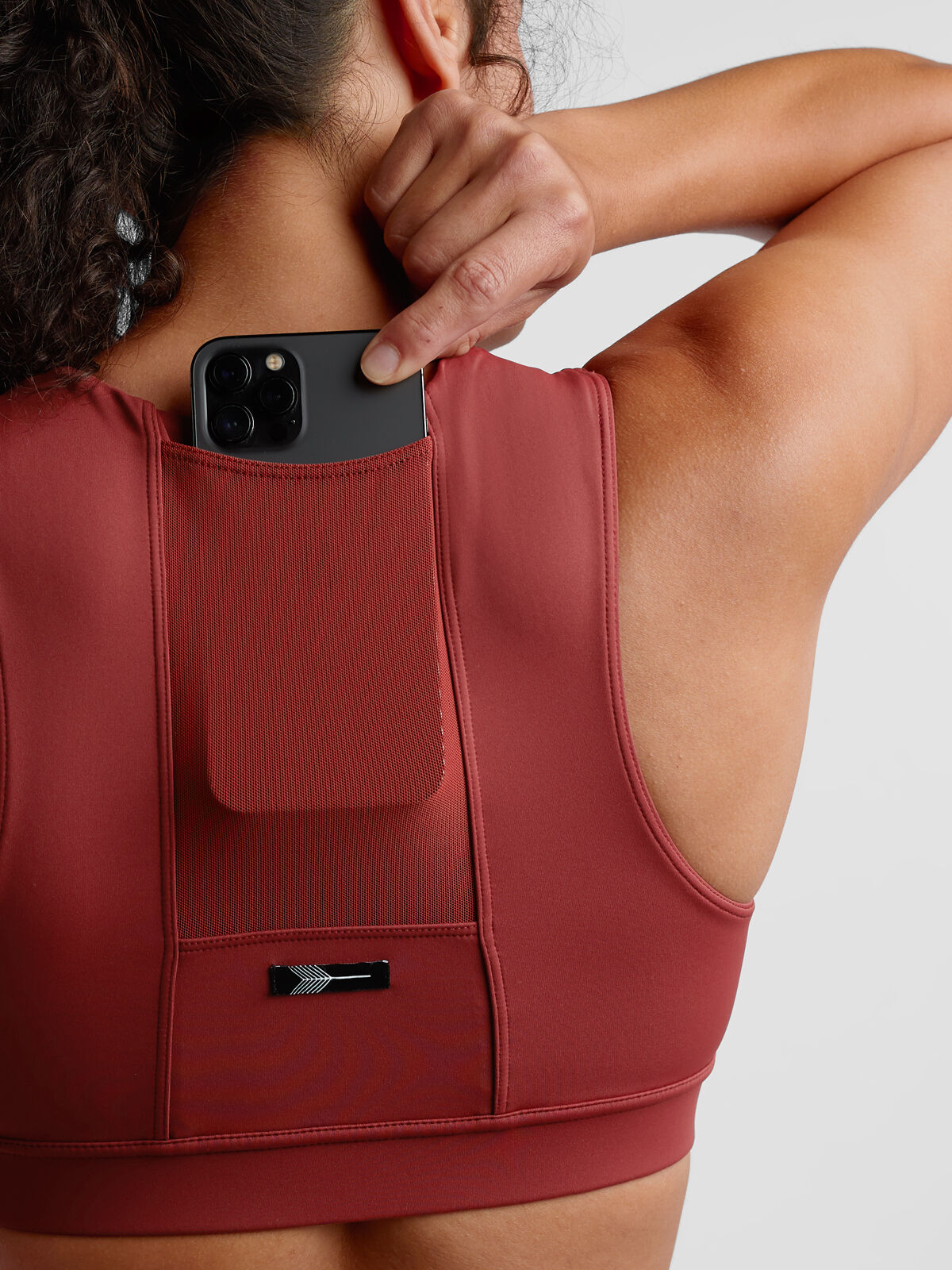 Sports bra with back pocket store